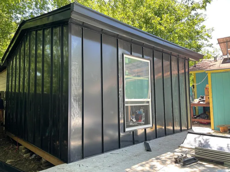 Black standing seam metal wall panels for Roof Inspection in Kennedale