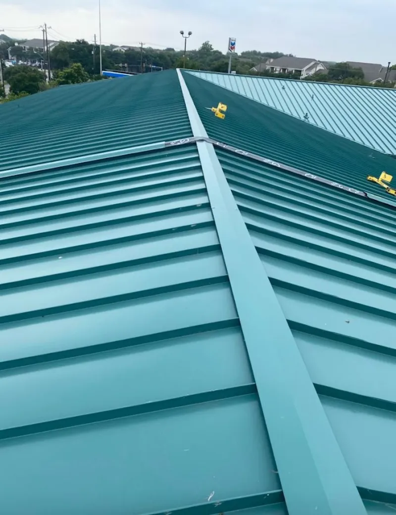 Green commercial metal roof ridge and valley for Metal Roof Repair in Kennedale
