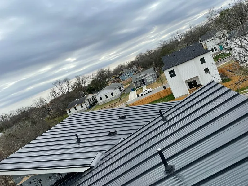 Standing seam metal roof panels with vents for Skylight Repair in Kennedale